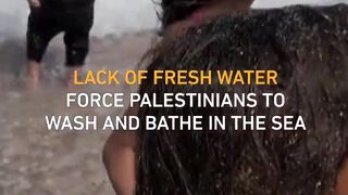Lack of fresh water force Palestinians to wash and bathe in the sea