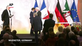 French President Emmanuel Macron awarded peace prize during Germany trip.
