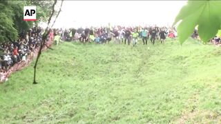 WATCH_ England's annual cheese rolling race.