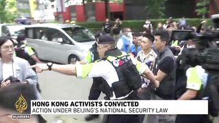 Hong Kong court finds 14 of 16 democracy activists guilty of subversion.