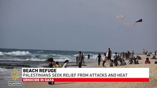 Beach refuge: Palestinians seek relief from attacks and heat