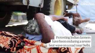 Protesting Indian farmers endure severe heatwave.