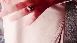 Red legs of a pigeon