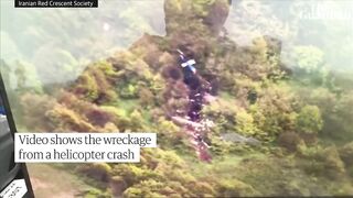 Footage shows aftermath of helicopter crash that killed Iranian president.