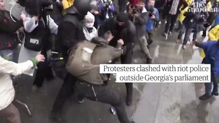 Clashes at Georgian parliament as 'foreign agents bill' passes.