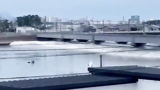 Keep children away from video_ Powerful earthquake causes tsunami in Japan(360P).