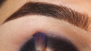 Purple And Orange Glitter Makeup Look