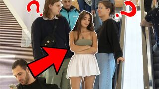 A very naughty girl on the escalator prank