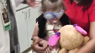 Precious moment a blind daughter can see for the first time after eye surgeries