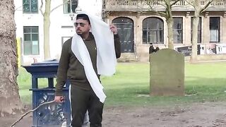 Carrying_massive_stick_in_public_back