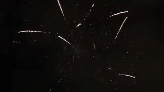 Fireworks display at night