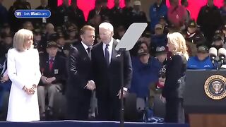 Biden unsure whether to sit or stand before hasty D Day exit(360P).