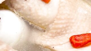 CHICKEN COOKED WITH COCONUT