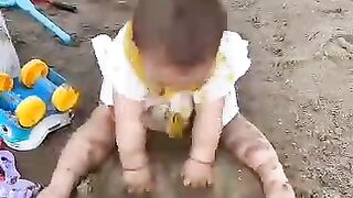 #Childrenplayingwithsand