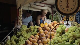 Choosing vegetables at a market