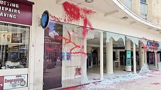Pro-Palestine protestors attack branches of Barclays Bank