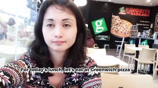 Eating at Greenwich pizza shop