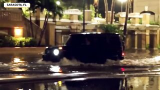 South Florida hit with record intense rain, stalling vehicles in flooded streets