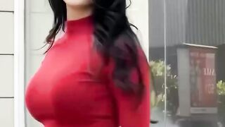Beautiful model in Red shirt and white pants fashion