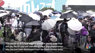 BTS fans line up to hug Jin after his discharge from the South Korean army