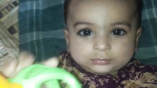 Cute Baby Girl playing with toys