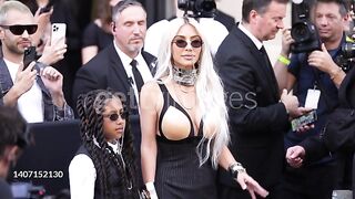 PARIS, FRANCE - JULY 6: (SLOW-MO) North West and Kim Kardashian attends the Jean Paul