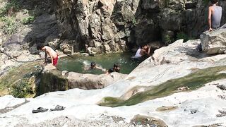 Oh my God, my kids are swimming on the edge of the mountain