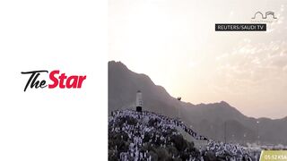 Muslim pilgrims converge at Mount Arafat for daylong worship as Hajj reaches its peak