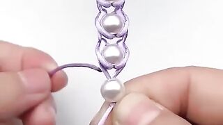 Instructions for tying a super beautiful purple beaded bracelet #crafts #tutorial #shorts.