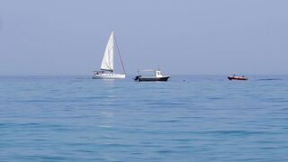 a calm ship on a clear sea