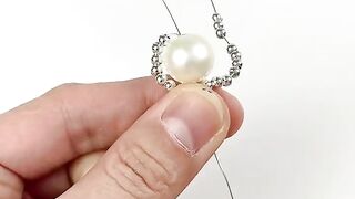 Hand-wound pearl necklace.