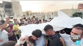 Palestinians in Khan Younis rushed the dead and injured to the local hospital