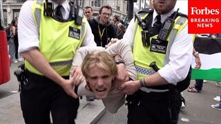 Police Respond As Pro-Palestinian Protesters Block Road Junction At Oxford Circus In London