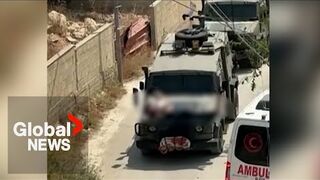 Israel investigating military after strapping wounded Palestinian man to vehicle hood while driving