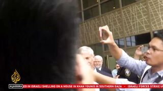 WikiLeaks founder following a hearing at US District Court in Saipan 2