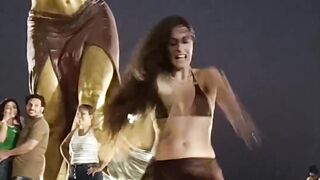 Aroused Celebrity Dance in Front of Statue
