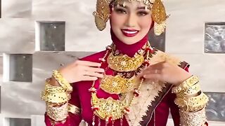 a very beautiful Lampung tribe girl dressed in traditional Lampung clothing