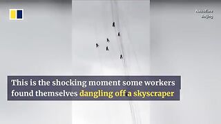 Windstorm leaves window cleaners dangling off skyscraper
