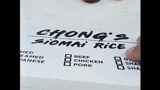 Trying fried siomai with rice
