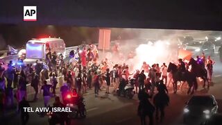Tel Aviv police use water cannons against protesters demanding hostage release deal, fresh elections.