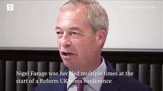 Nigel Farage heckled multiple times during Reform UK press conference.