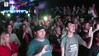 UK election_ Voters cheer as Labour predicted landslide win.