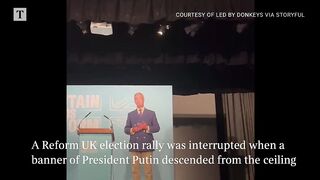 Putin banner interrupts Nigel Farage speech in Essex.