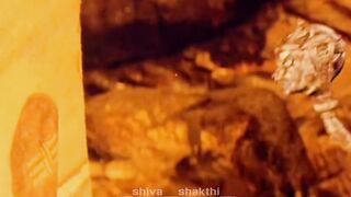 In this mesmerizing reel, witness the divine strength and compassion of Lord Shiva as he stands protective...evoted follower