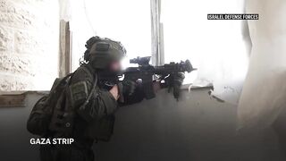 Israeli troops seen in Gaza as forces advance deeper in territory's largest city.