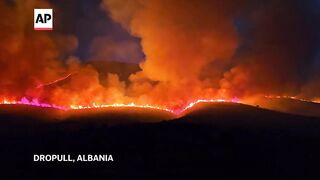 Firefighters, military carry out efforts to extinguish wildfires in southern Albania.