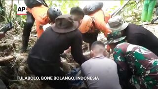Search continues for missing miners in Indonesia after landslide at illegal gold mine.