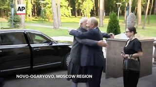 Putin welcomes Indian PM Narendra Modi to his residence outside Moscow.