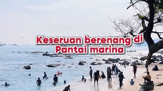 Bathing on the beach accompanied by friendly sea waves