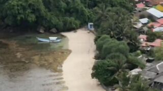 The beauty of Selalaw Island on the seashore seen from above using a drone